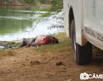 O corpo de um homem, de cor morena, aparentando 35 anos de idade, foi encontrado boiando nas aguas do Rio Mossoró. Foto - O Câmera.