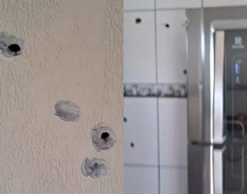 Casa ficou com marcas de tiros — Foto: Redes sociais